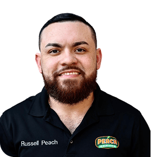 Owner of Peach Painting wearing his uniform.