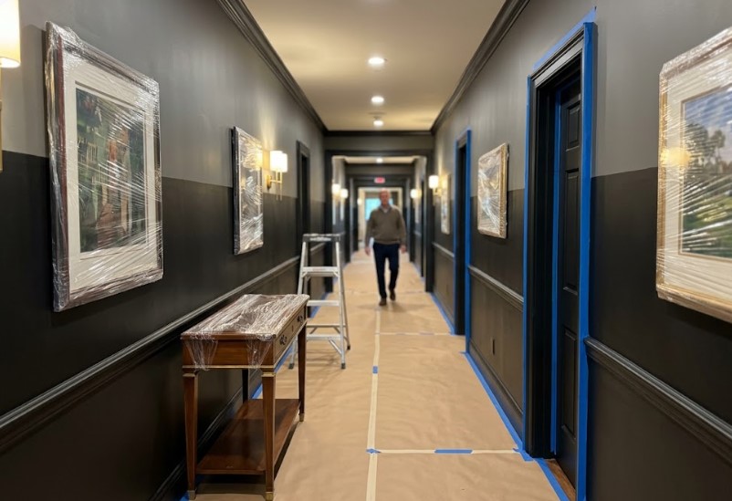 Peach Painting - Commercial vs Residential Painting in Tampa: Schedules Differ a hallway prepared for painting